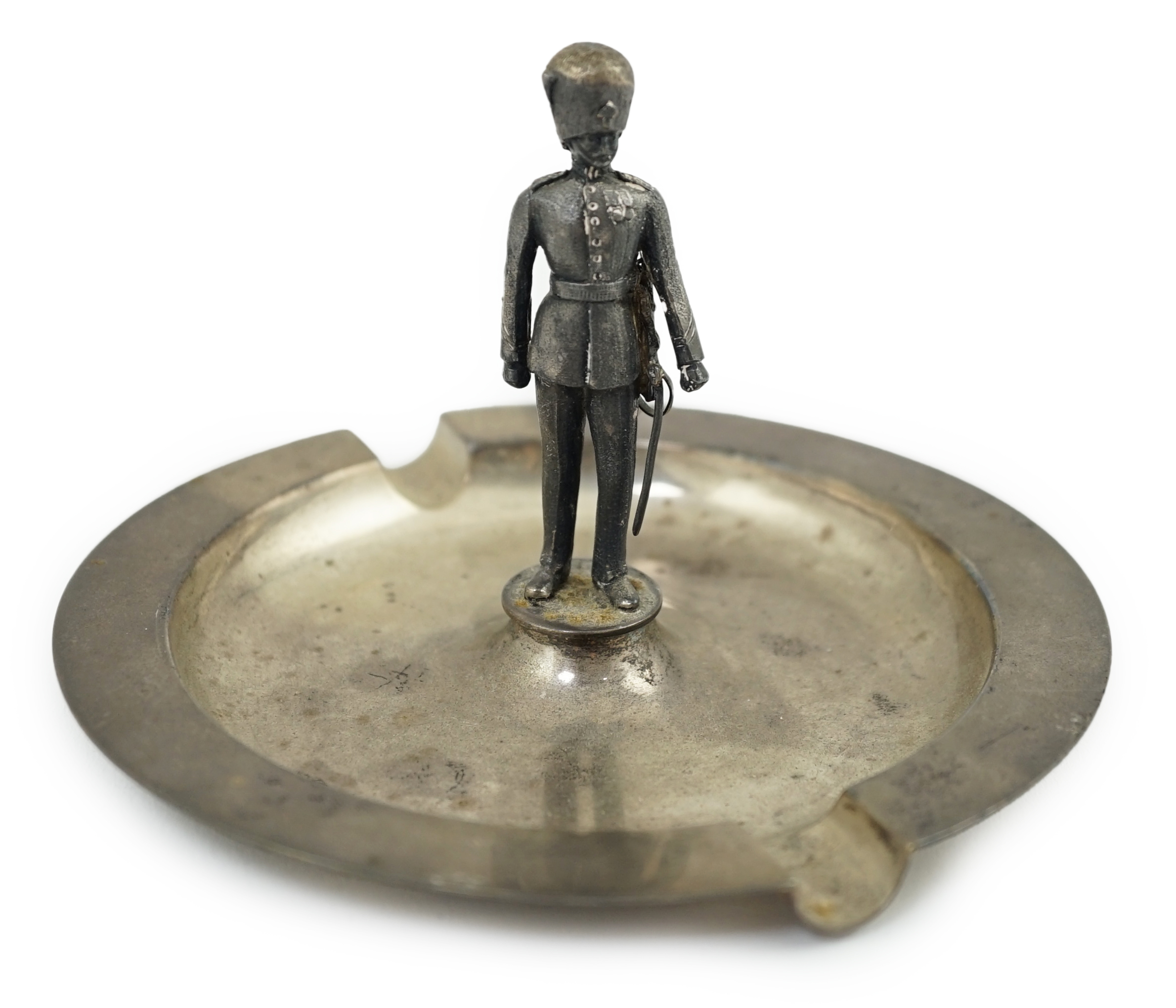 An Elizabeth II Silver Grenadier guardsman ashtray, by Garrard & Co